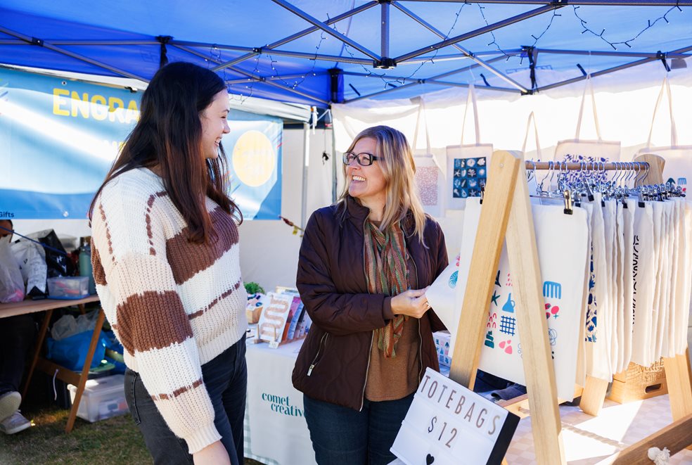 Image Caption: Market stallholder at City community event - 2025 Avon Descent Finish Line Festival.